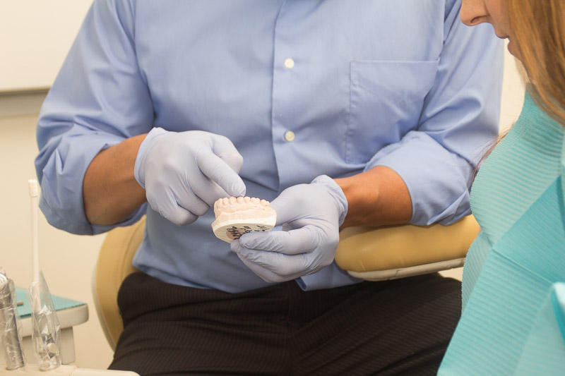 Escondido dentist explains procedure to patient